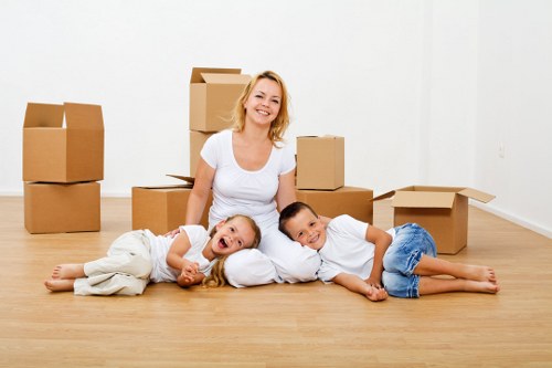 family packing seasonal items for household storage in Temple
